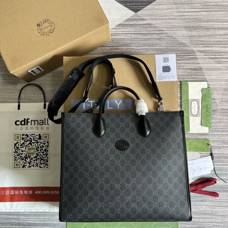 G*u*i shopping bags